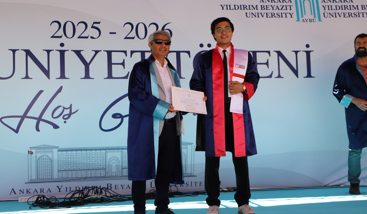 Our valedictorian receives their diploma.