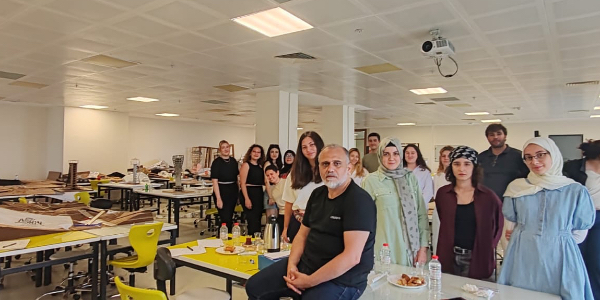 Photo of lecturer and students