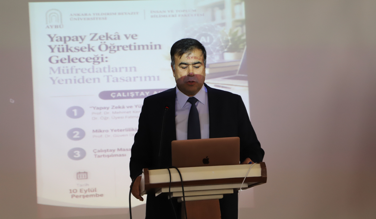 Photo of our Dean delivering a speech at the podium.