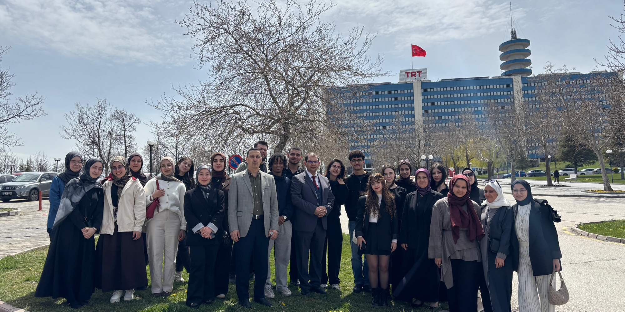 A group photo with our students in front of the TRT  Building.