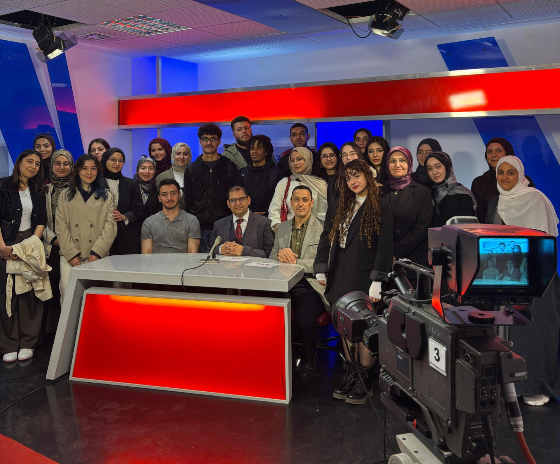 A group photo with our students at the TRT News studio.
