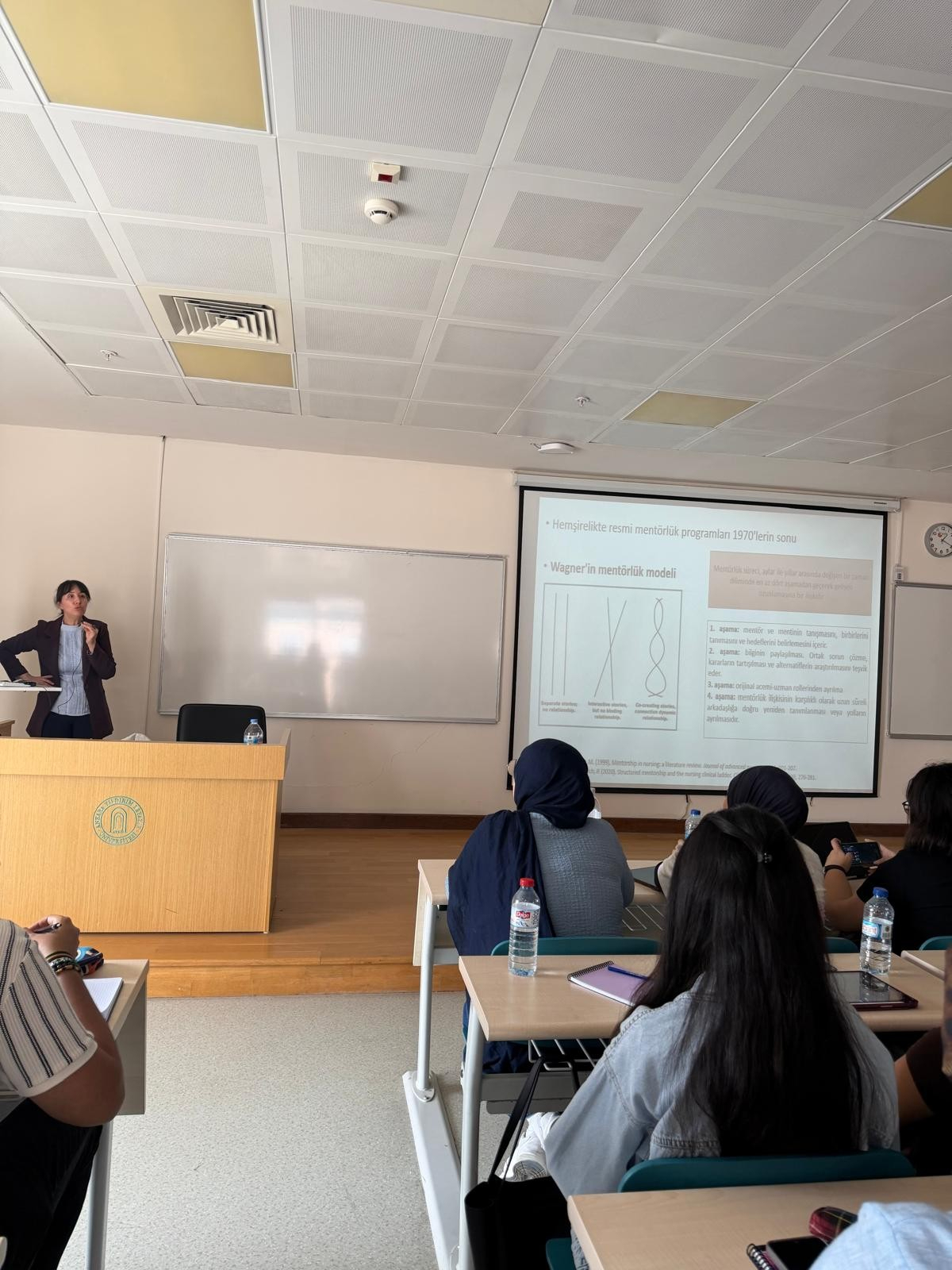 Associate Professor Reyhan Eskiyurt explaining the stages of the Mentor–Mentee Program and the activities to be carried out at each stage to second-year students.